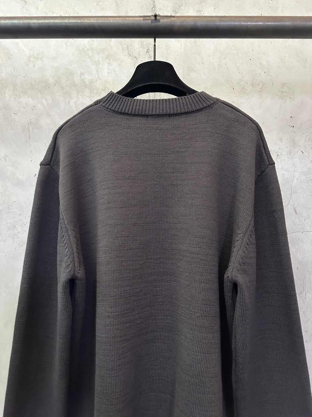 Long-sleeve knit sweater back view, dark gray with ribbed collar