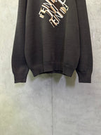 Long-sleeve knit sweater hem and cuffs detail, dark gray