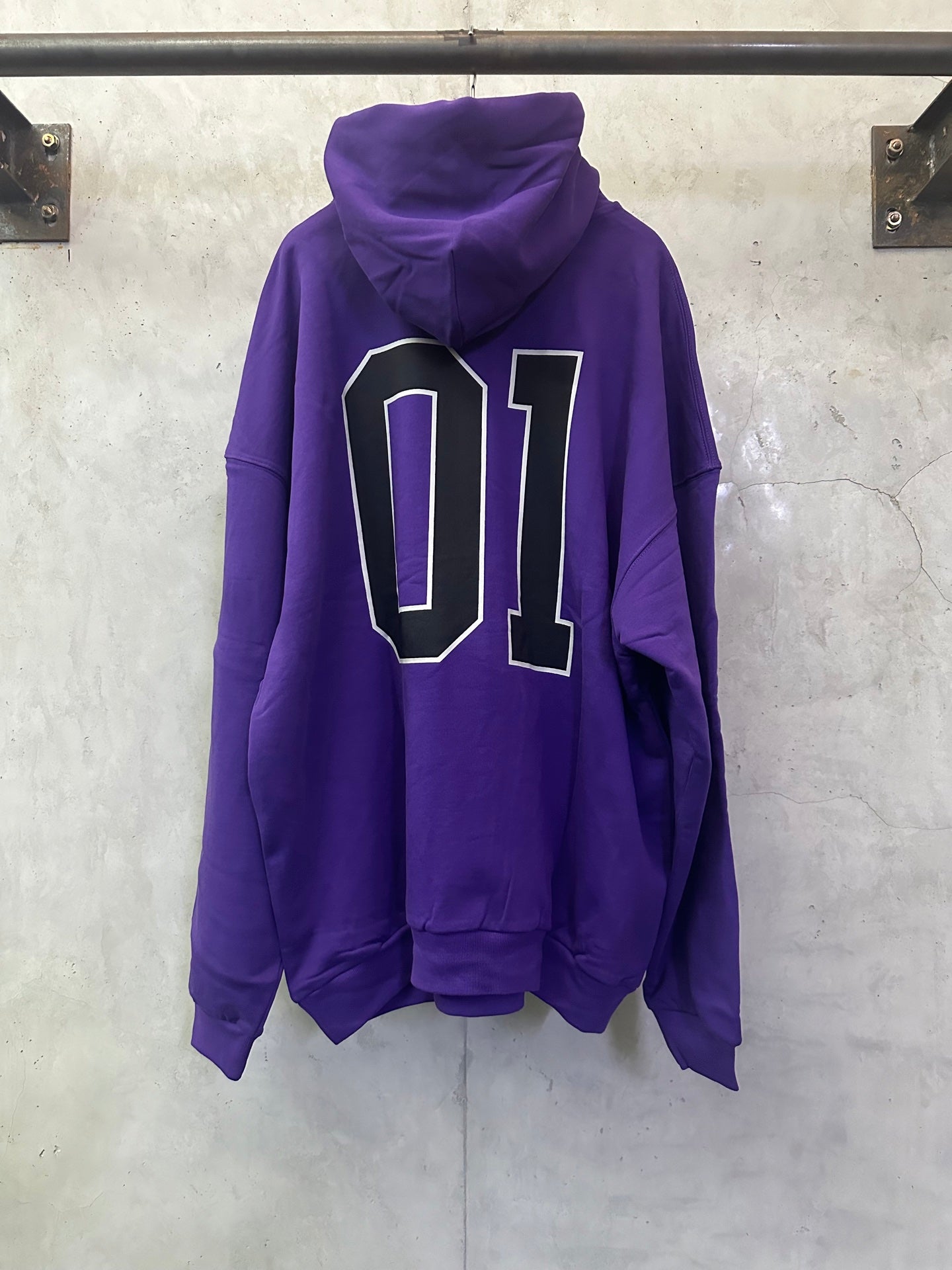 Purple Balenciaga hoodie back view with large '01' number graphic