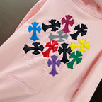 Pink hoodie with multicolor clover/star applique detail on the chest