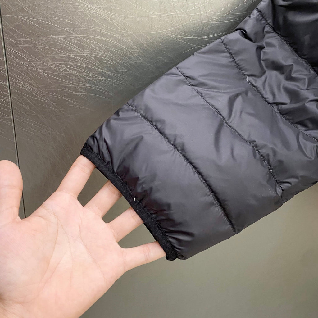 Ralph Lauren puffer jacket sleeve cuff with quilted panels, dark charcoal color