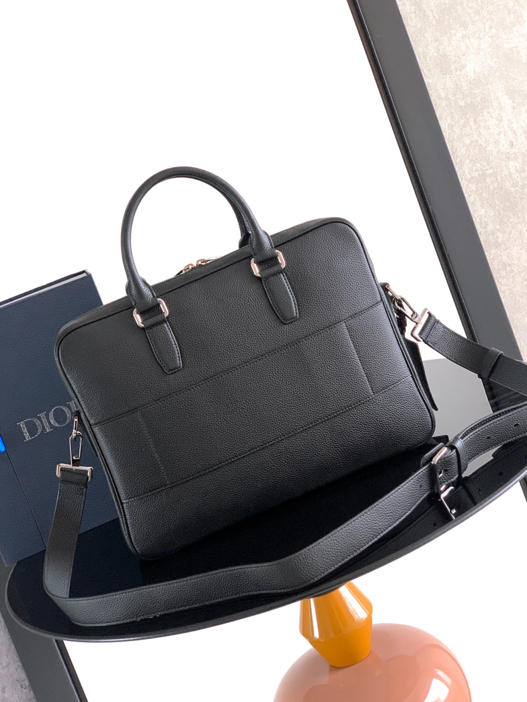 Men's Dior leather briefcase bag with dual top handles and shoulder strap