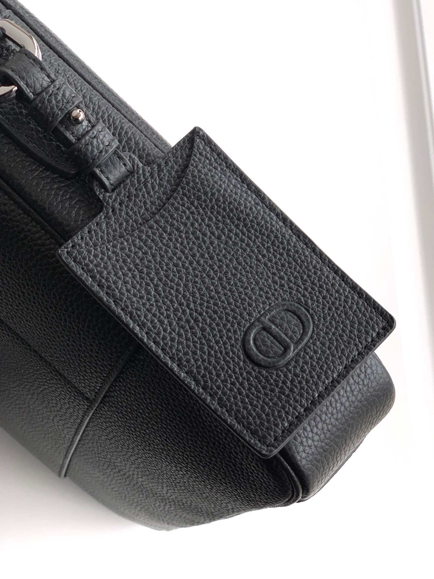 Dior men's textured leather flap pocket with embossed D logo