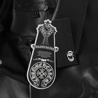Black leather jacket with white hang tag attached near collar