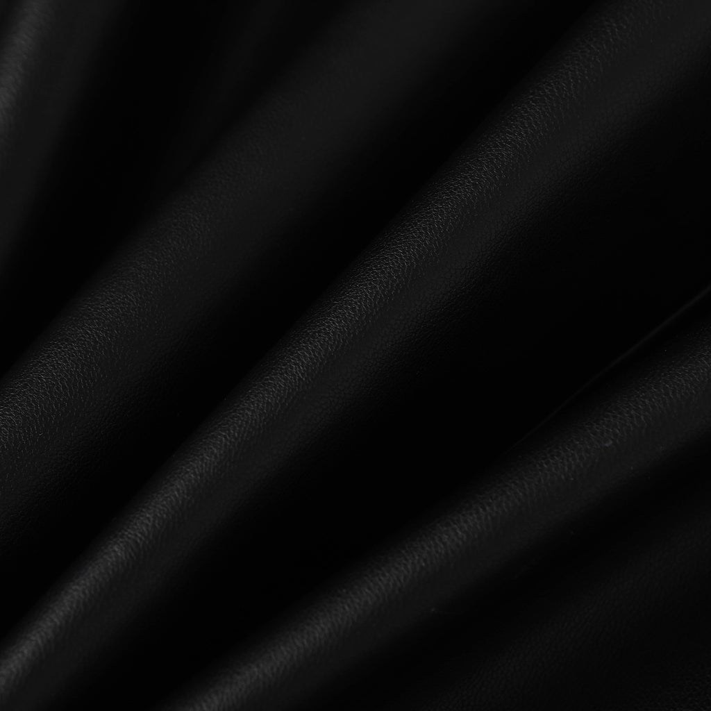 Black textured fabric with subtle embossed pattern and smooth paneling