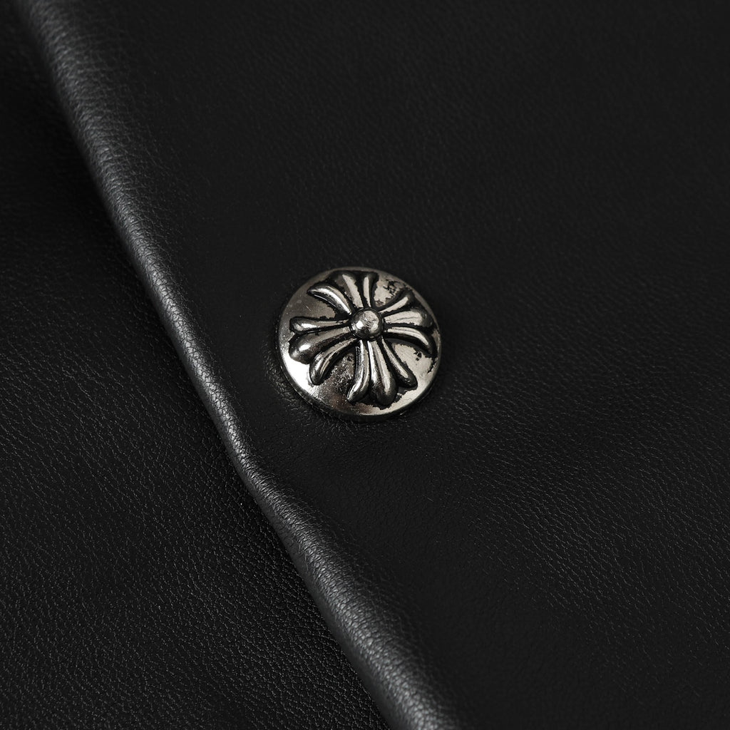 Black leather jacket with round silver-tone snap button