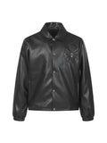 Black leather jacket with stand collar, snap front, and embroidered floral detail