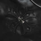 Black leather jacket with embroidered floral design on chest