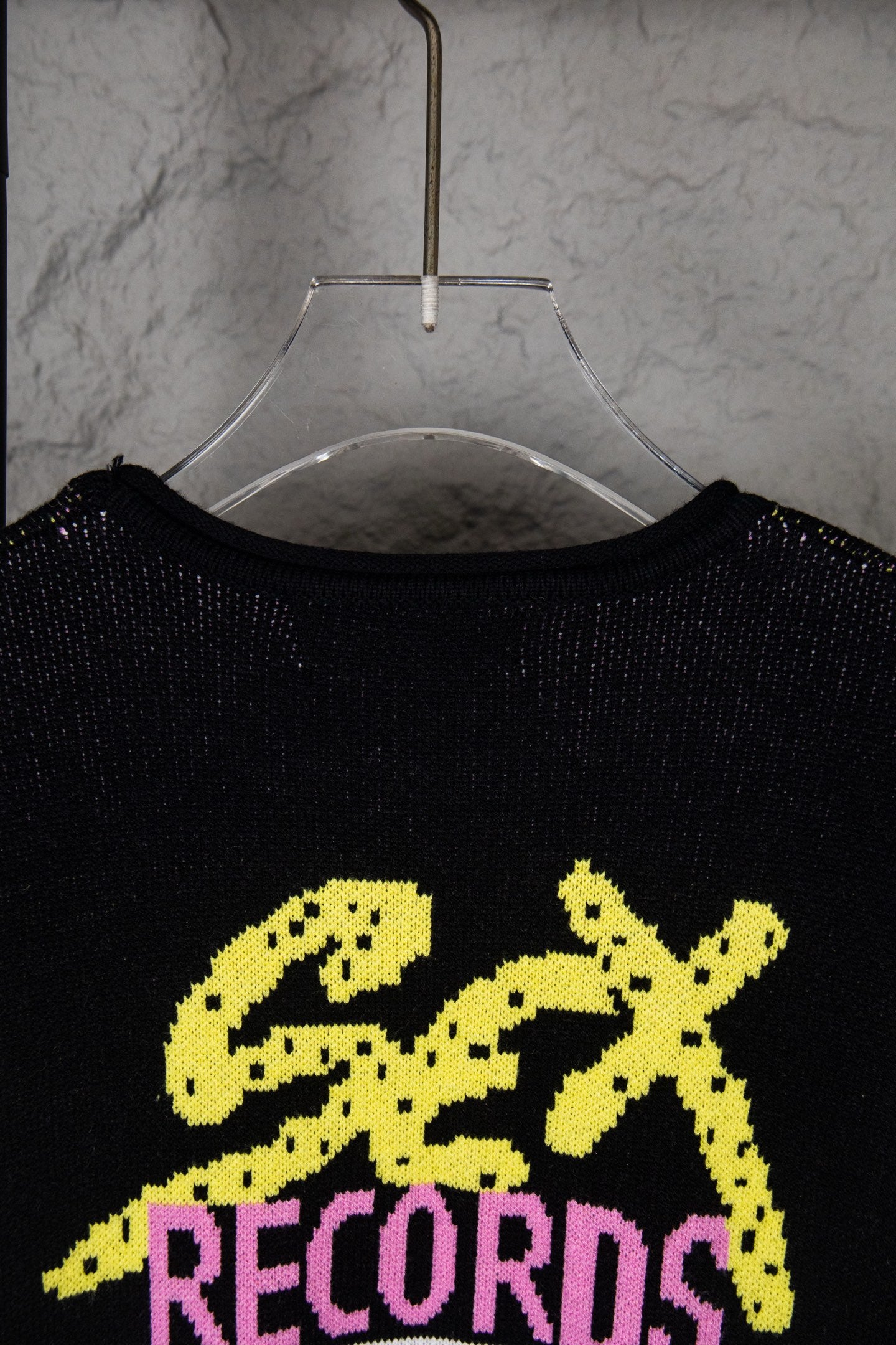 Black sweatshirt front with large yellow “Chrome Records” graphic