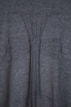 Gray knit sweater back seam and ribbed vertical panel detail