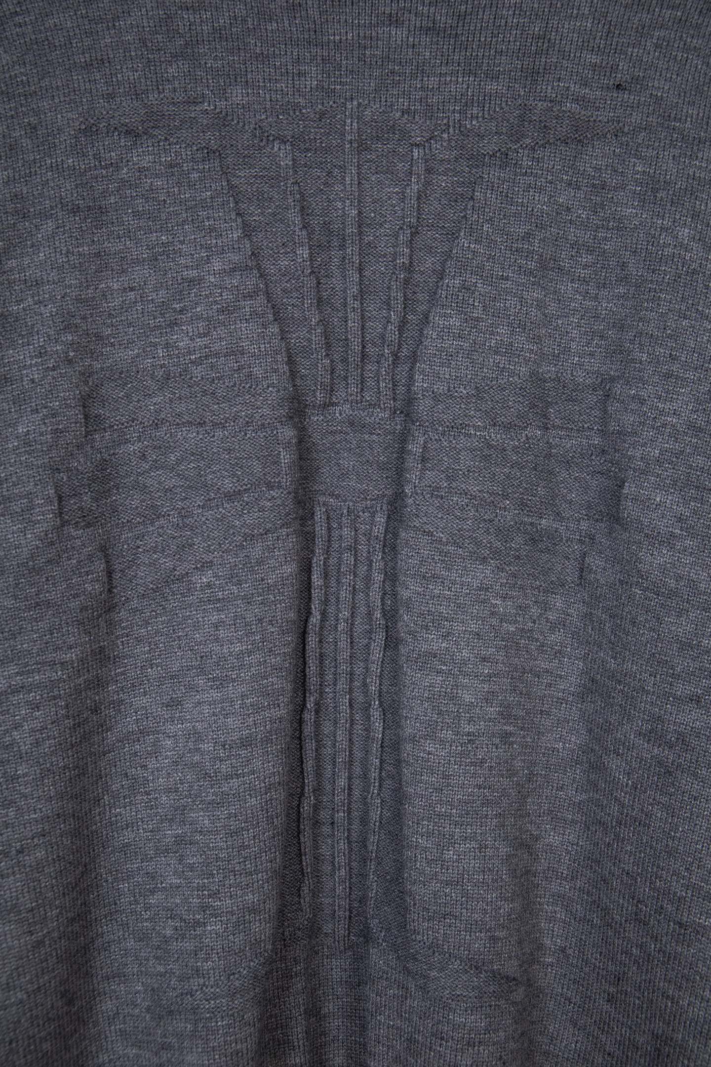 Gray knit sweater back seam and ribbed vertical panel detail