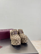 Gucci GG canvas mule loafers with gold-tone horsebit strap, side view
