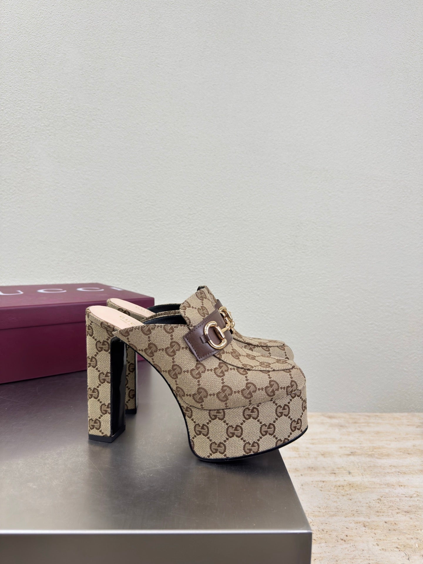 Gucci GG canvas mule loafers with high heel and gold-tone horsebit hardware