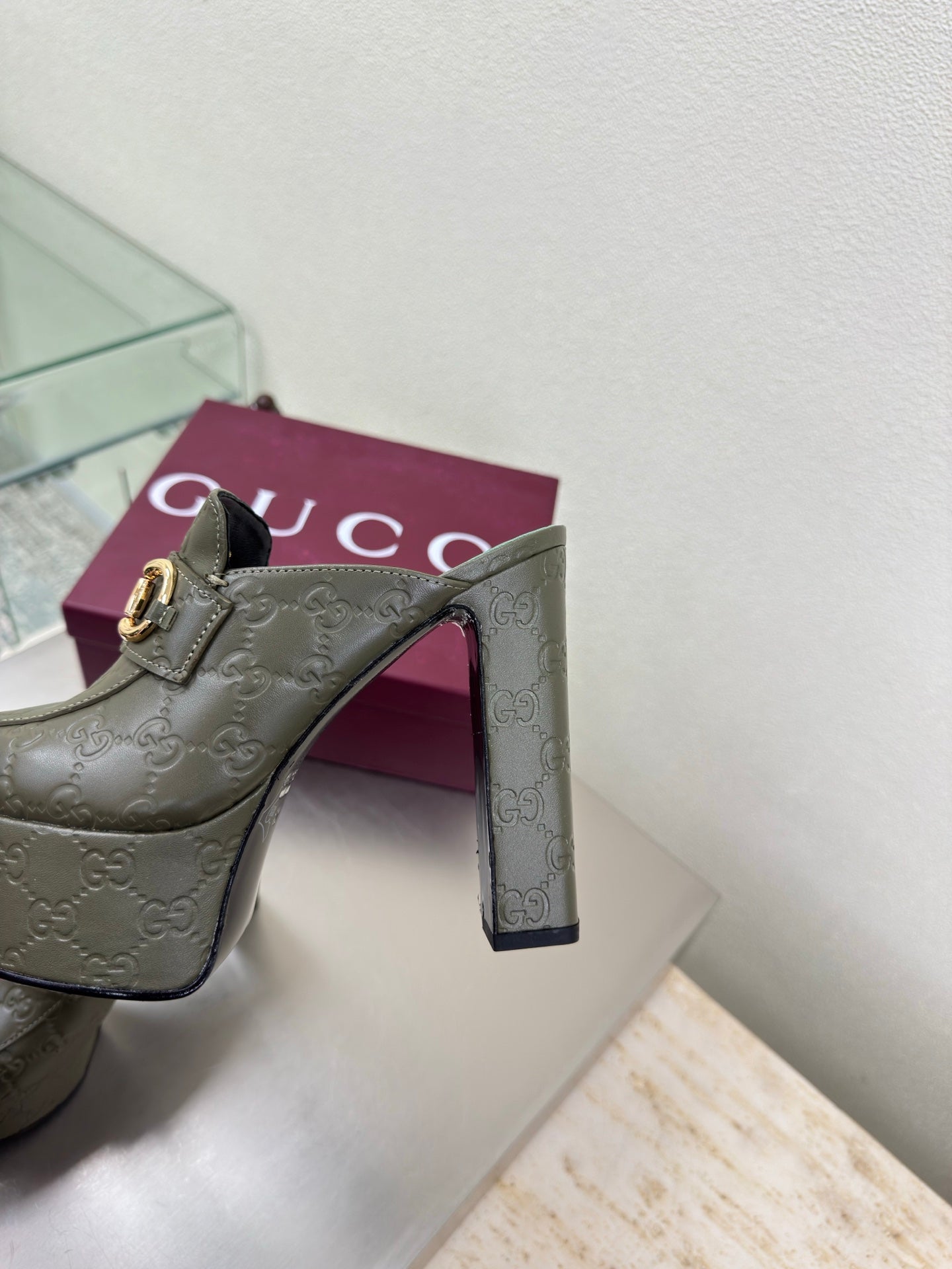 Gucci ladies dark green platform mules with gold horsebit buckle and side view detail
