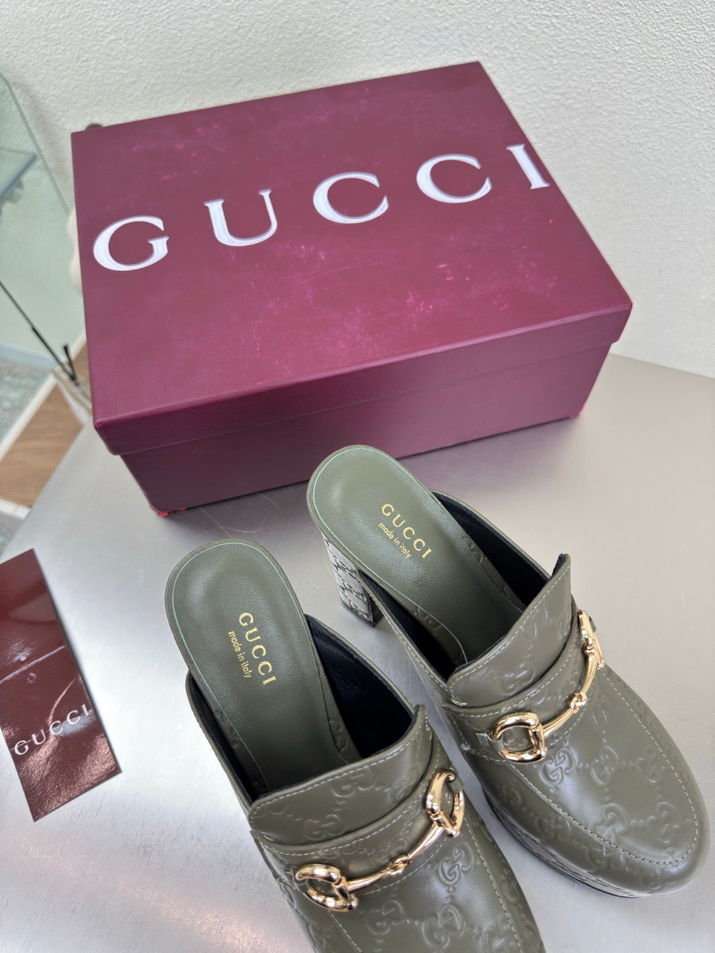 Gucci ladies platform mules, dark green leather with gold horsebit buckle ornament