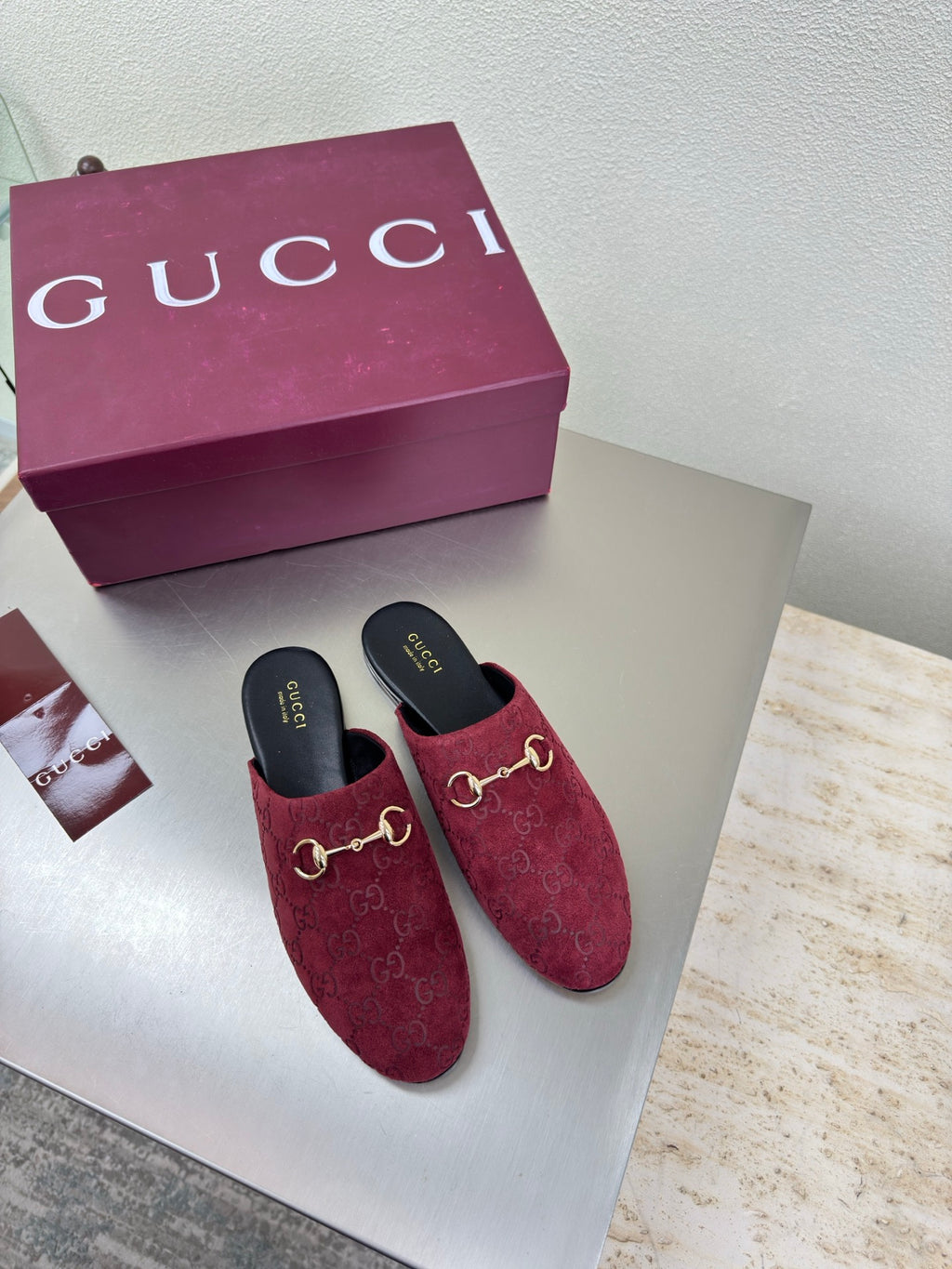 Gucci women's burgundy GG-pattern mule shoes with gold horsebit detail