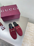 Gucci women's burgundy GG-pattern mule shoes with gold horsebit detail