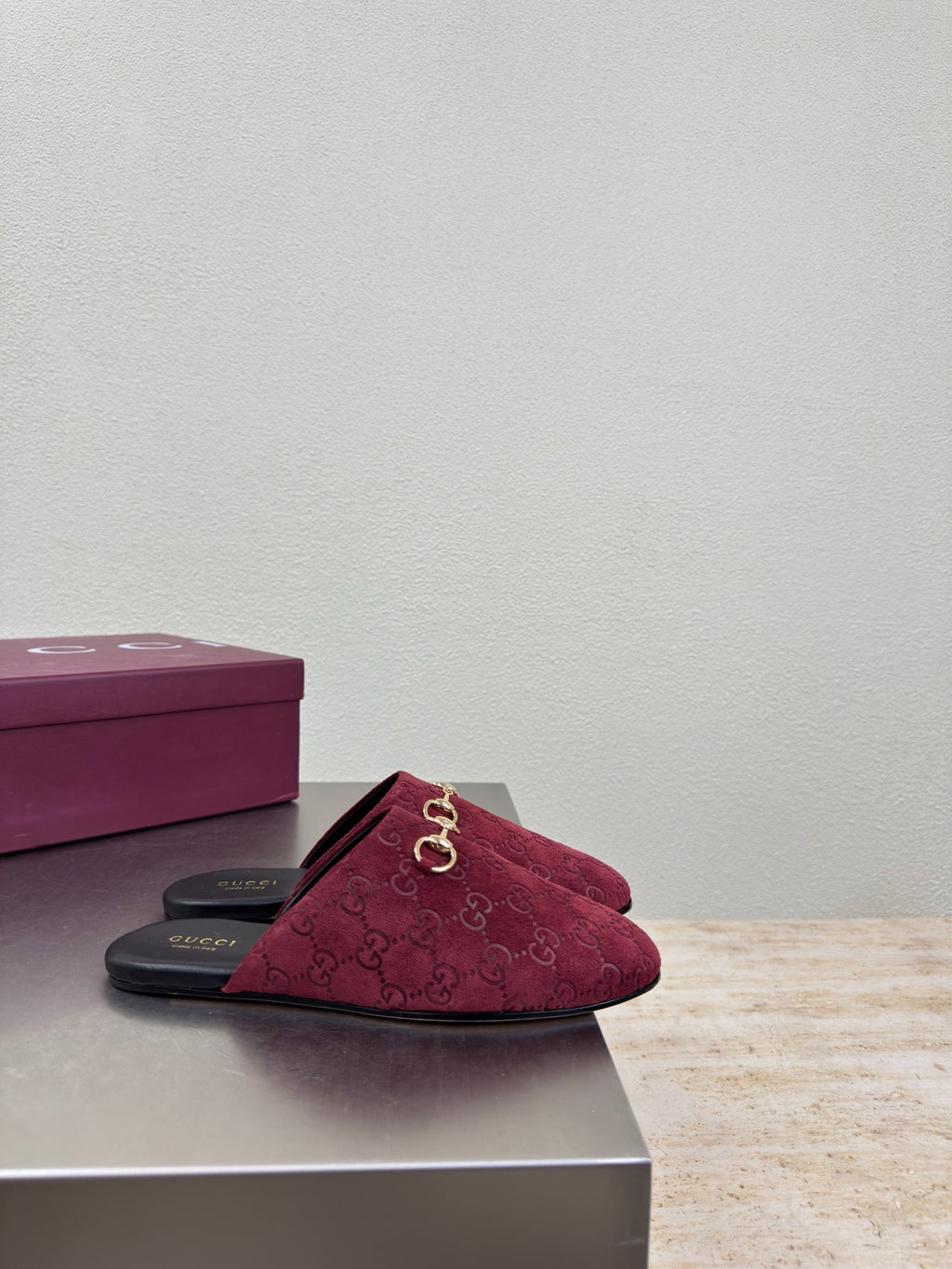 Gucci women's burgundy GG-pattern mule with gold horsebit and black footbed