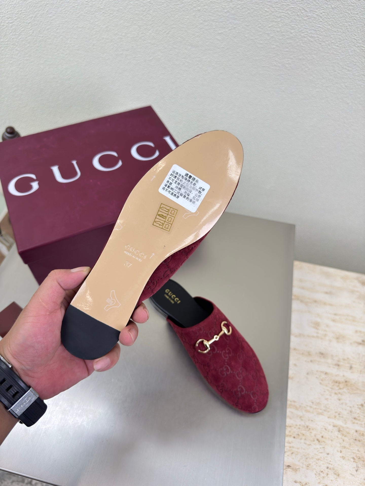 Gucci women's burgundy GG-pattern mule shoe with beige sole and gold horsebit