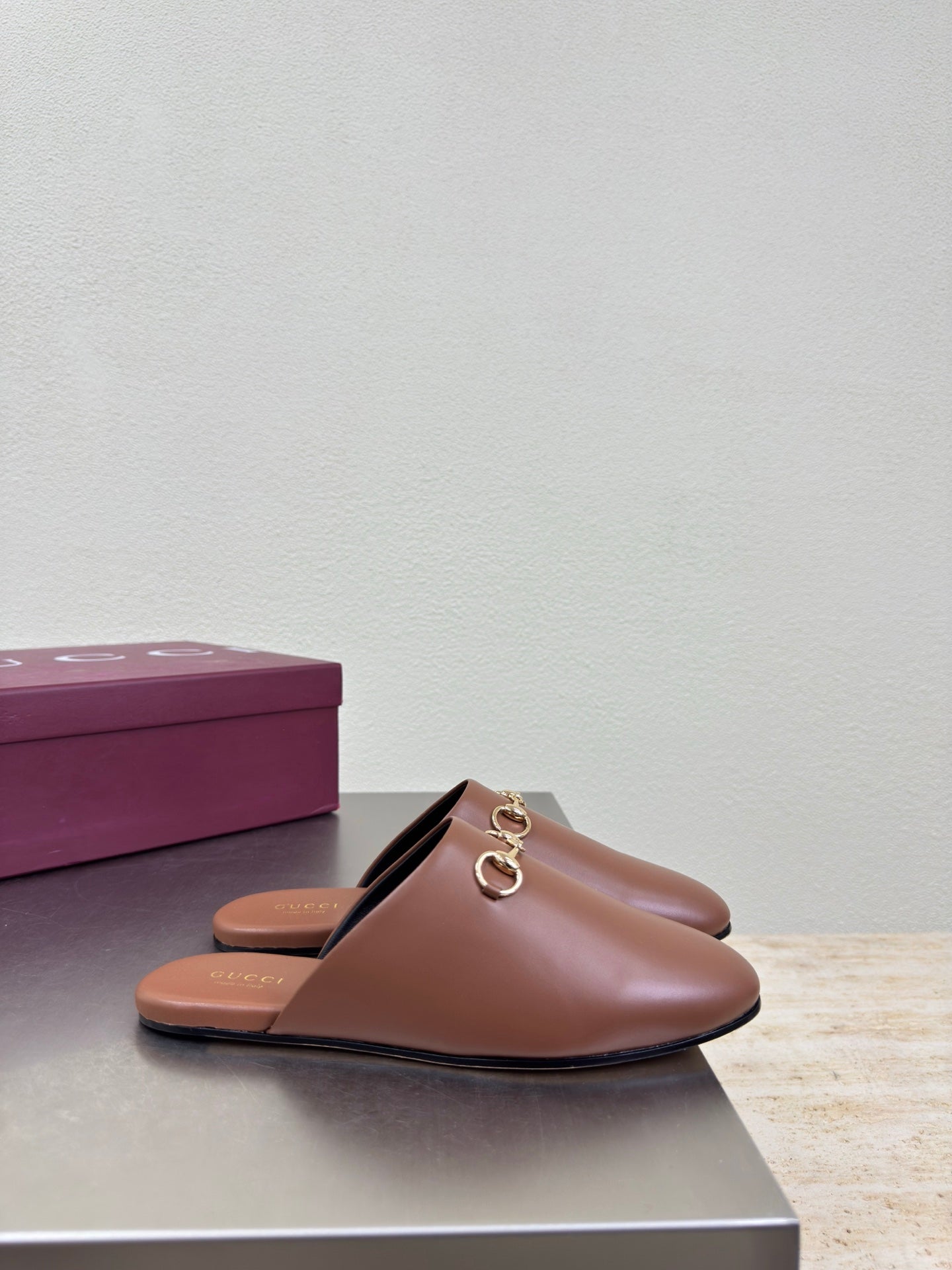 Gucci women's brown leather mule loafers with gold horsebit detail
