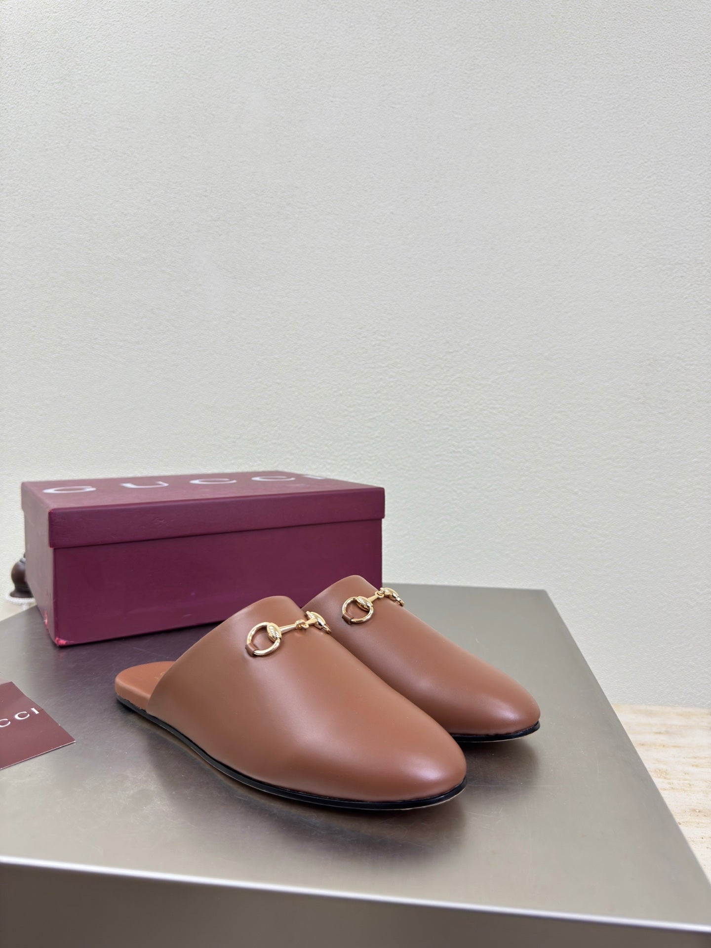Gucci women's brown leather mule loafers with gold horsebit detail