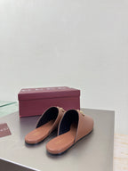 Gucci women's brown leather loafers with gold horsebit detail, top view