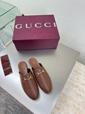 Gucci women's brown leather loafers with gold horsebit detail