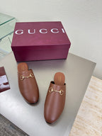 Gucci women's brown leather loafers with gold horsebit detail