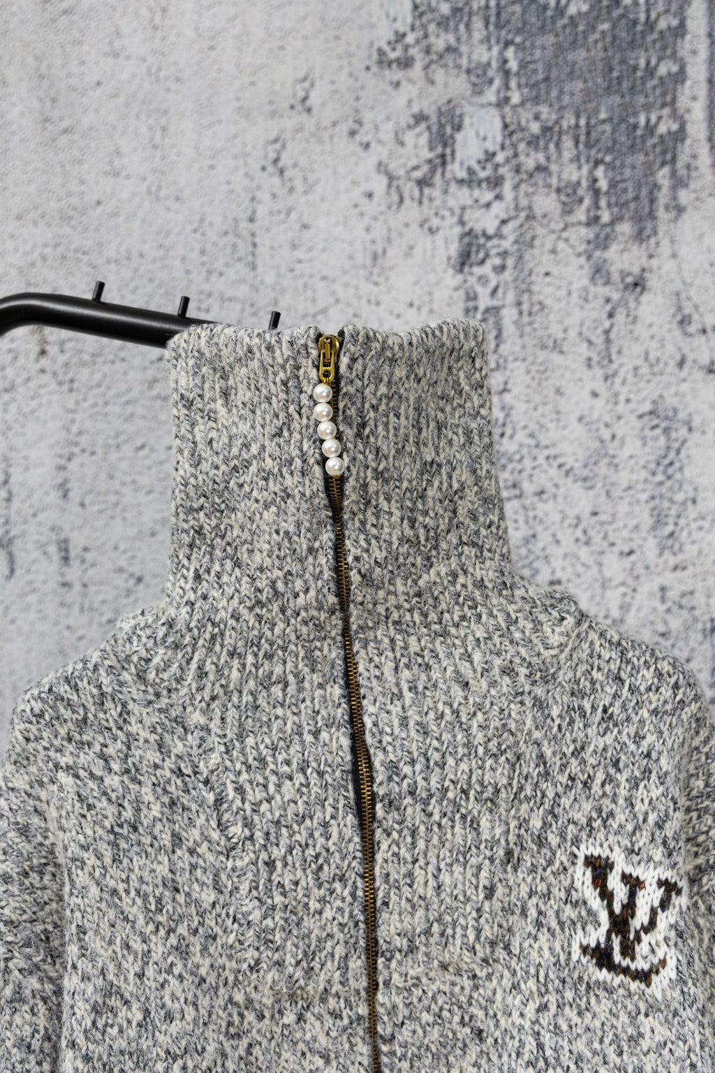 Grey knit sweater with zip front and small Louis Vuitton-style right-chest emblem