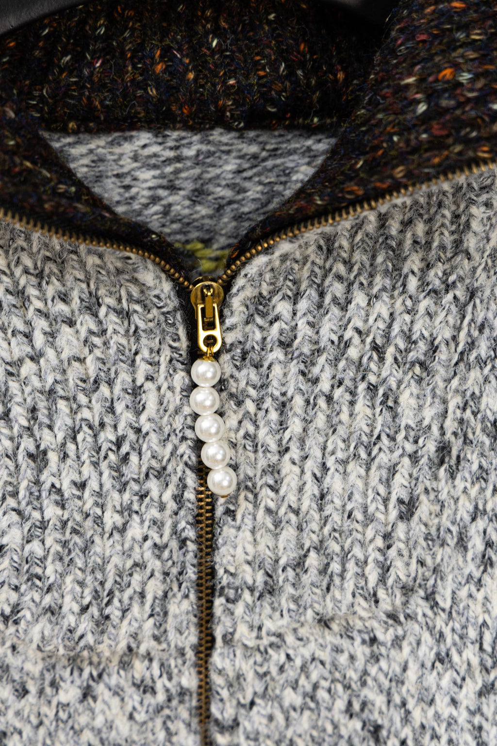 Long knit sweater with gold half-zip and faux pearl pull, textured gray