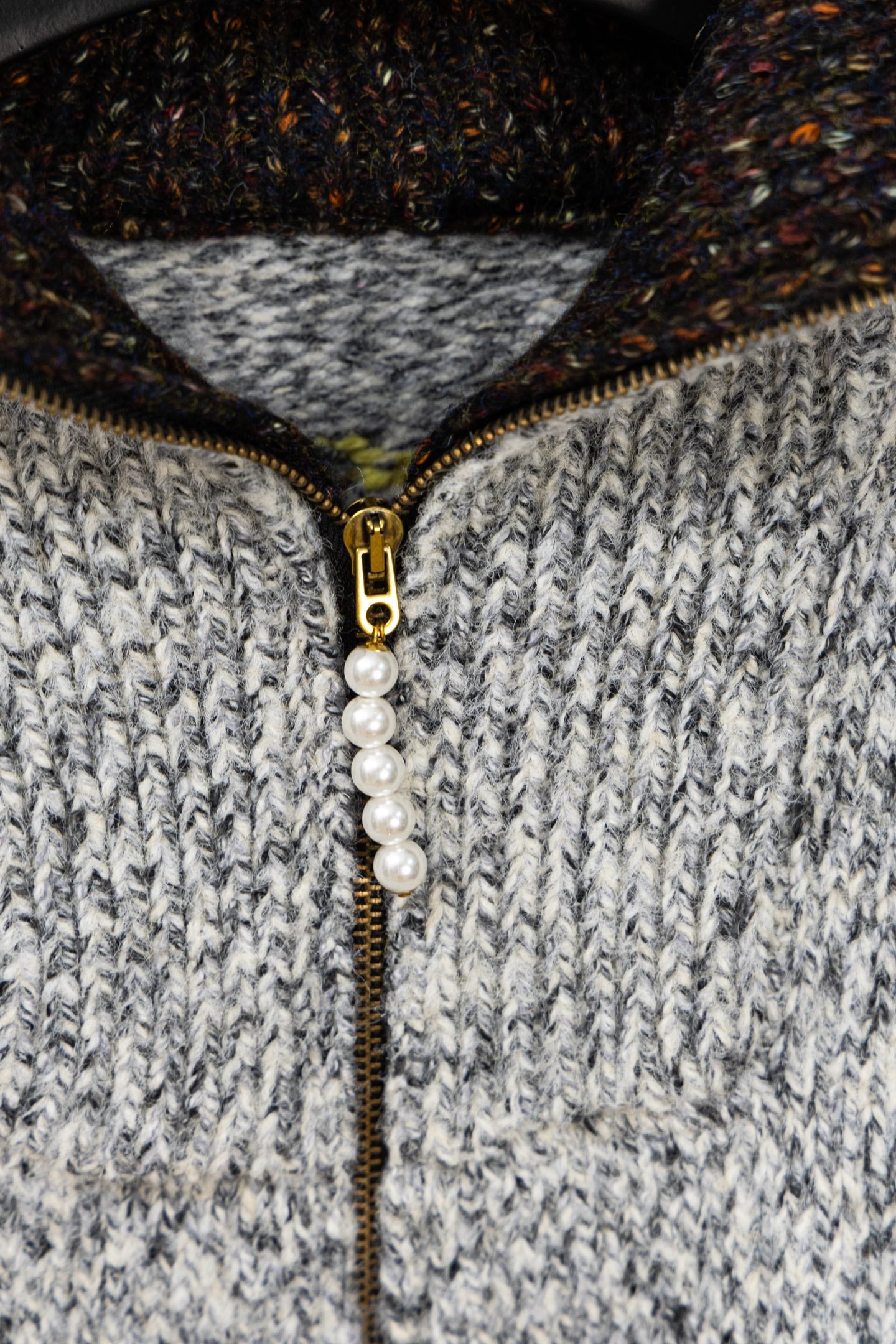 Long knit sweater with gold half-zip and faux pearl pull, textured gray