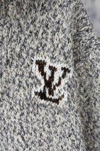 Long knit sweater with stitched smile logo patch on chest in white and brown