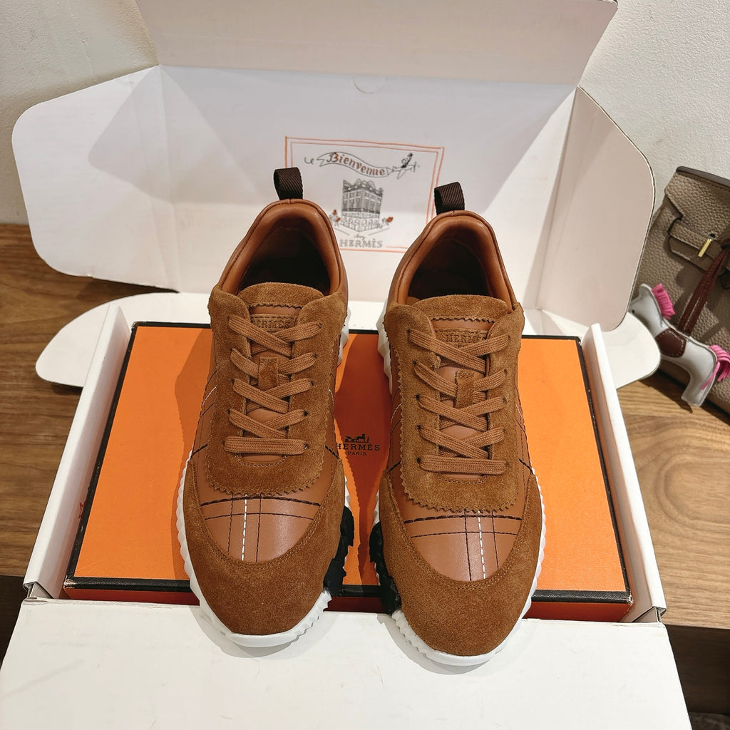 Hermes unisex sneakers, brown suede with lace-up front and white rubber sole.