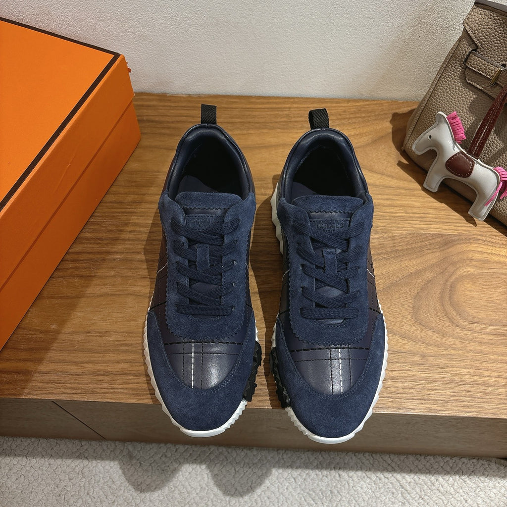 Unisex navy lace-up sneakers with suede upper and silver panel toe detail