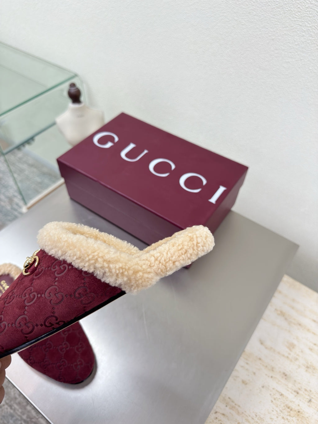 Gucci women's burgundy slip-on shoe with beige shearling collar and gold horsebit hardware