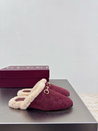 Gucci women's burgundy slip-on shoes with beige shearling lining and gold chain detail