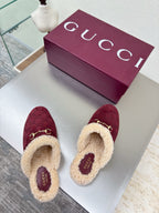 Gucci women's burgundy slip-on shoes with beige shearling lining and gold horsebit hardware