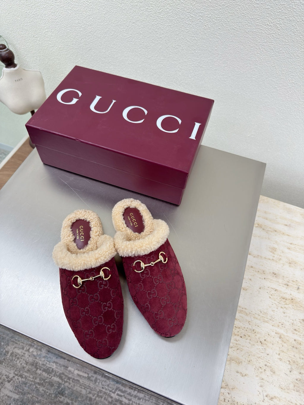 Gucci women's burgundy slip-on shoes with beige shearling trim and gold horsebit detail