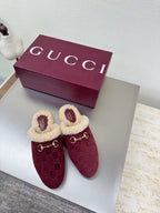 Gucci women's burgundy slip-on shoes with beige shearling trim and gold horsebit detail