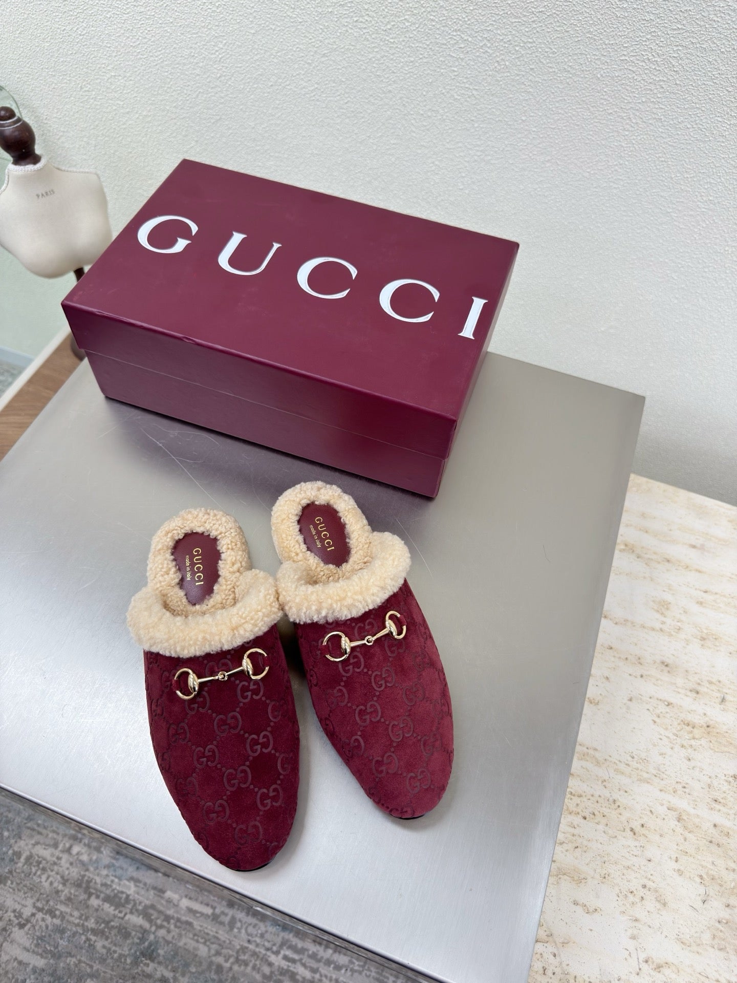 Gucci women's burgundy slip-on shoes with beige shearling trim and gold horsebit detail