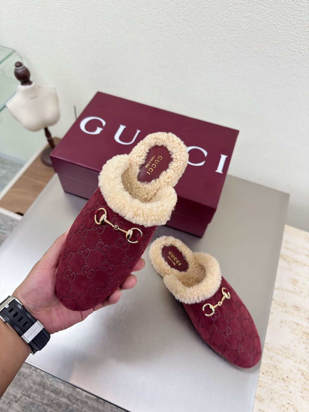 Gucci women's burgundy slip-on shoes with beige shearling trim and gold horsebit hardware