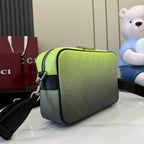 Gucci crossbody bag, lime green front with black side trim and chain strap.