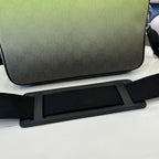 Gucci crossbody bag bottom view with lime green base and black adjustable strap.