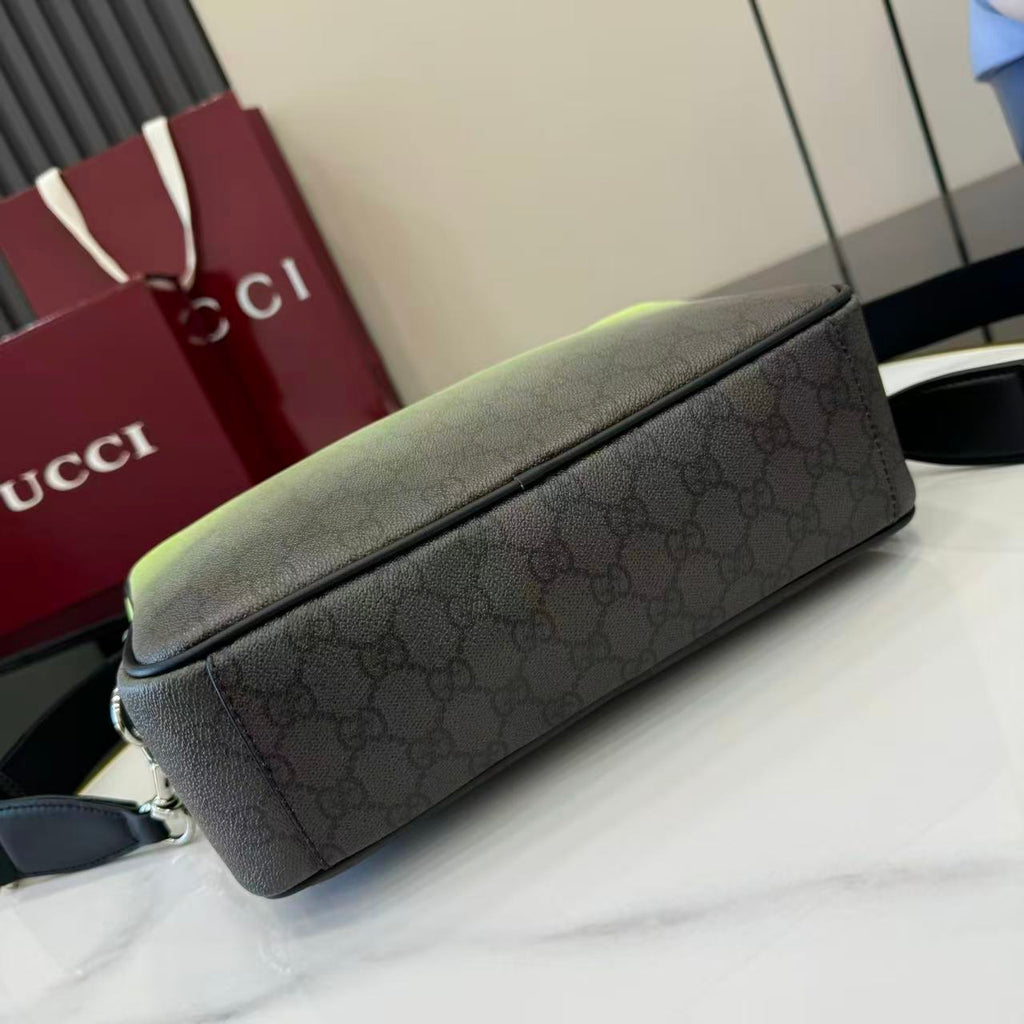 Gucci crossbody bag in lime green with dark monogram pattern and black piping.