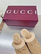 Beige GG monogram mule clogs with tan shearling lining and gold horsebit hardware