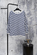 Blue knit sweater with Dior monogram pattern and ribbed crew neckline