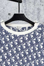 Dior monogram knit sweater neckline with ribbed white trim and blue pattern