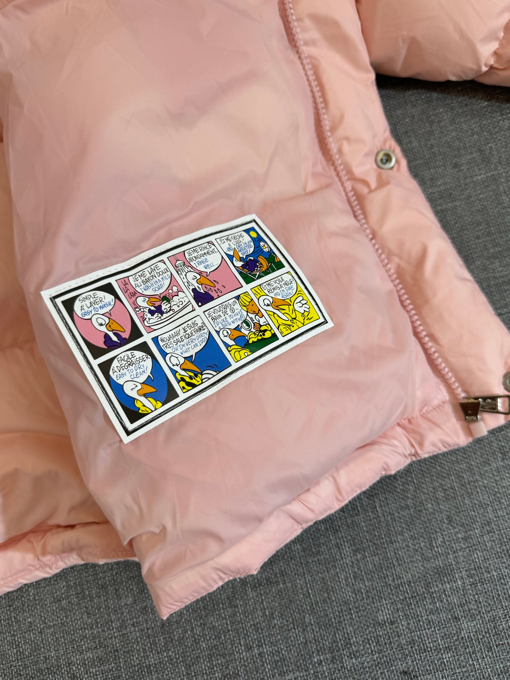 Moncler long puffer coat, pale pink with graphic chest patch and zipper