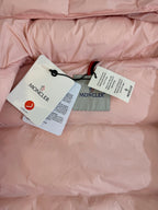 Moncler long puffer jacket lining with pink quilted padding and attached tags