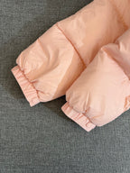 Moncler long puffer jacket, pink padded cuffs with snap buttons on quilted fabric